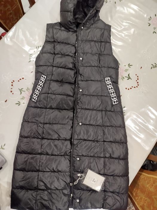 Женская жилетка.