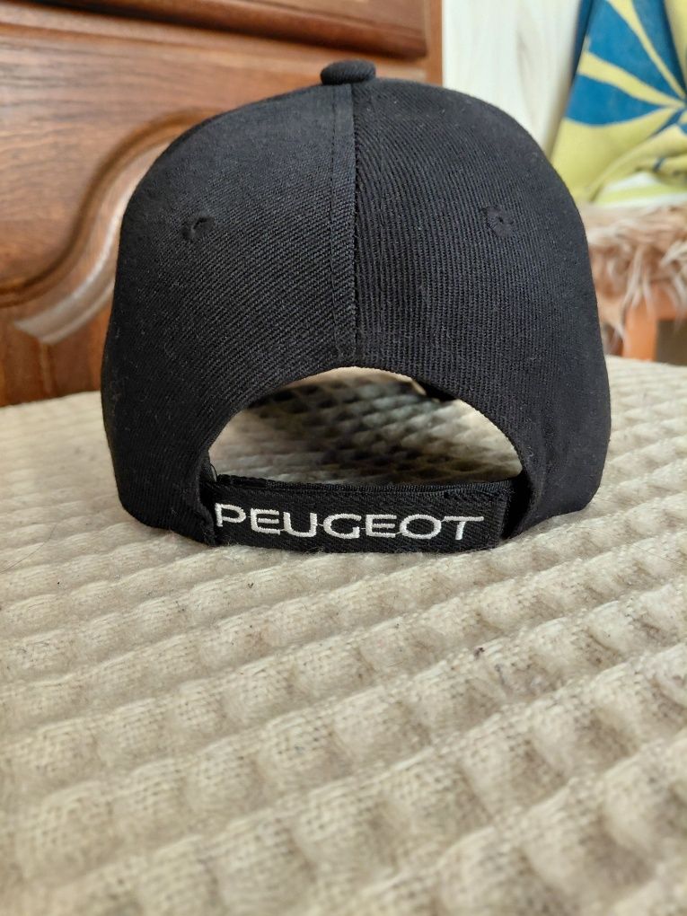 Шапка на Peugeot