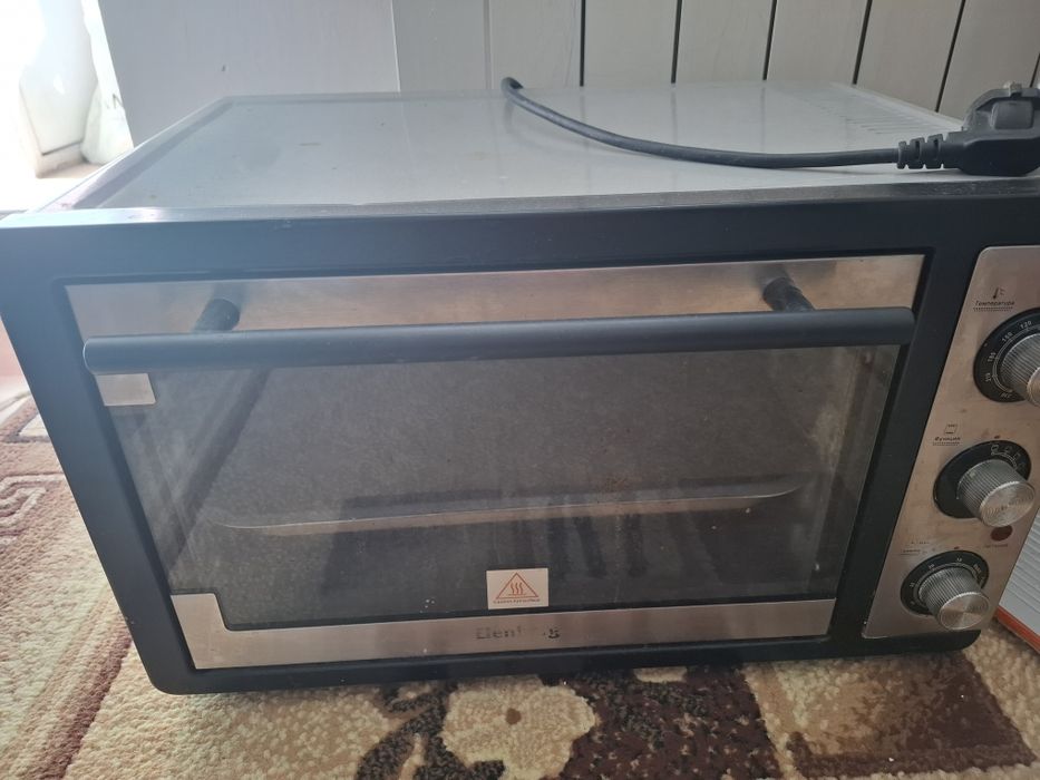 Продам духовку Elenberg