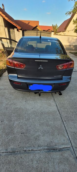 Vând mitsubishi lancer