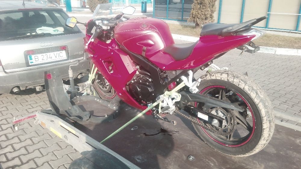 Transport motocicleta cu remorca specializata
