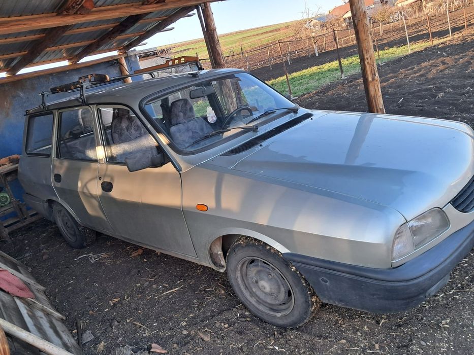 Vând Dacia Break.