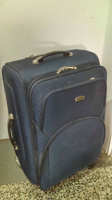 Голям куфар с колелца