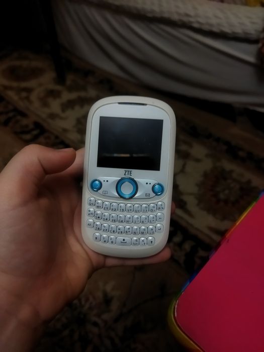 Телефон ZTE q200