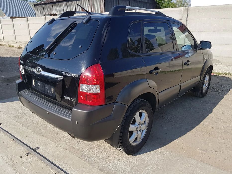 USA DREAPTA FATA / USA STANGA SPATE  HYUNDAI TUCSON 2006