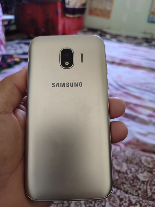 Telefon sotiladi  J 2