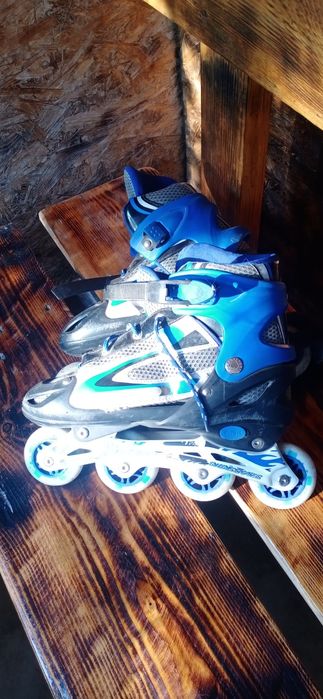 Раздвижные роликовые коньки