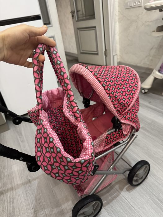 Qizchala uchun mini kolyaska