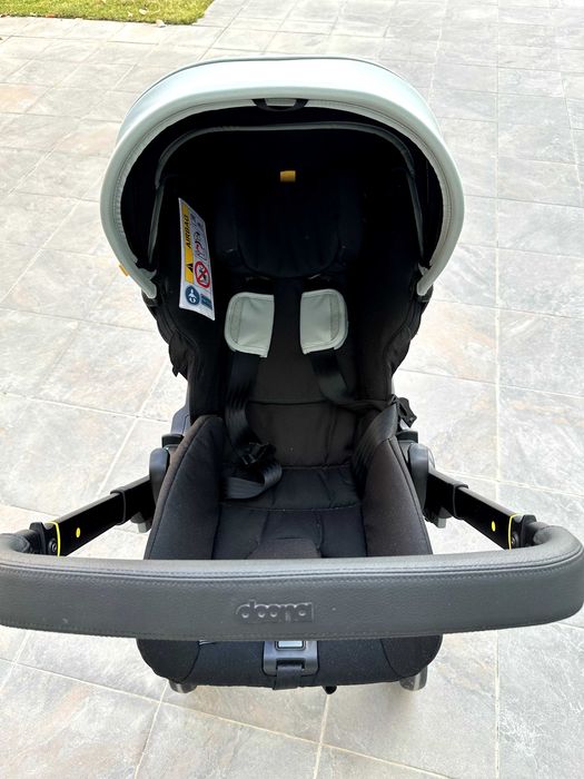 Автокресло и детская коляска Doona