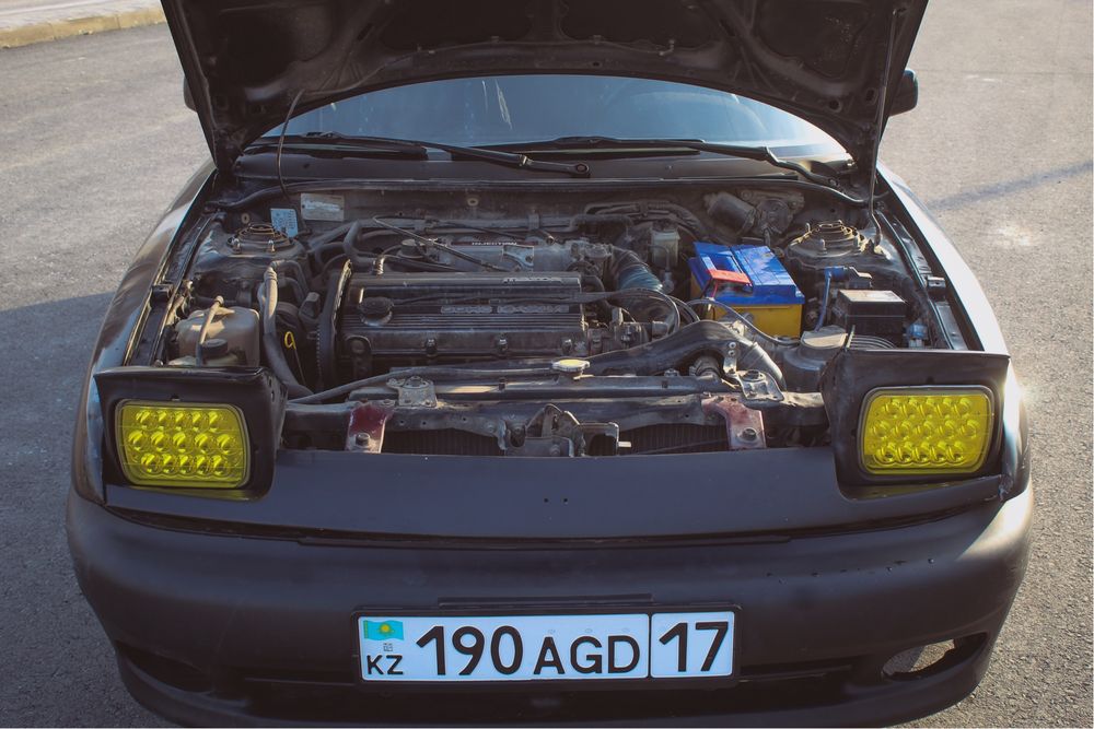 Mazda 323f (1.8 16V DOHC)