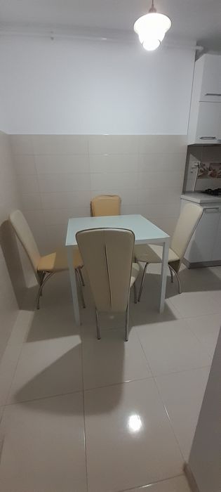 Masa dining+ 4 scaune gratis.