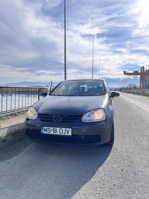 Vand golf 5 motor 1.4 sau schimb cu bmw