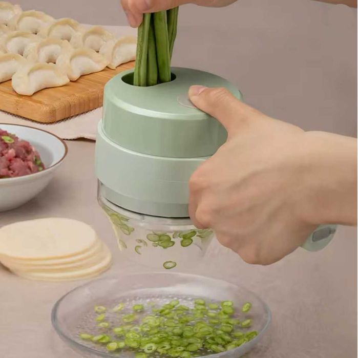 Tocator de legume cu 4 functii: taiere, feliere, maruntire si decojire