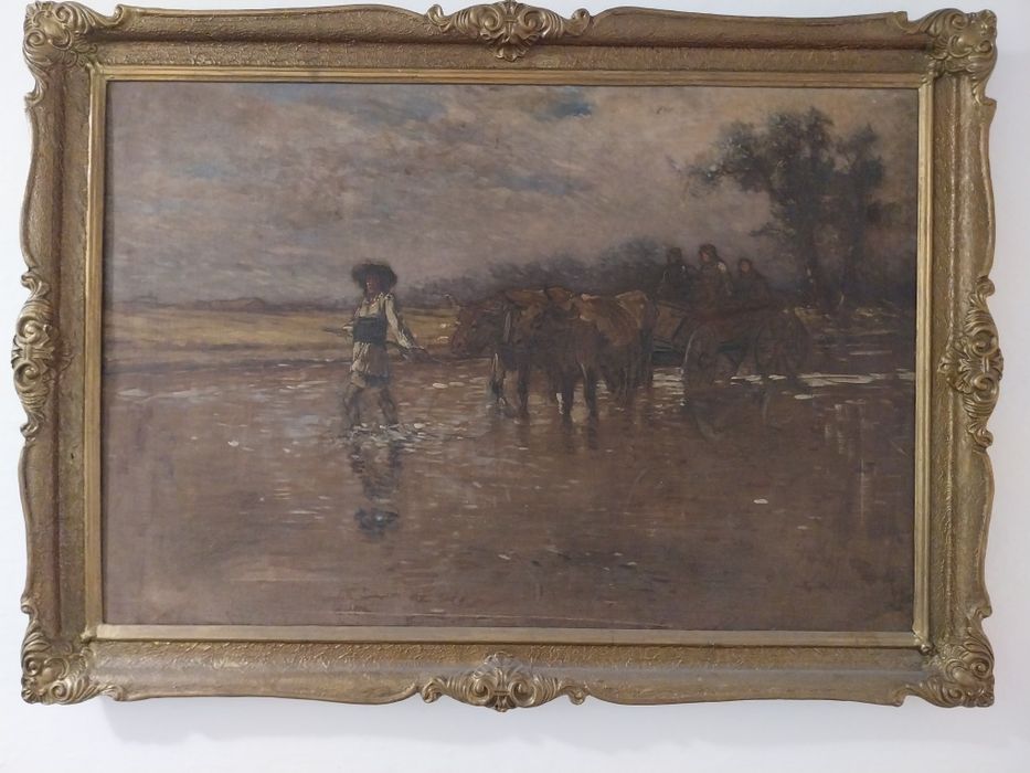 Car cu țărani traversând un parau.