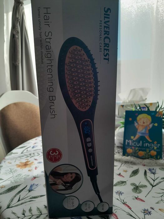 Perie pentru indreptat parul