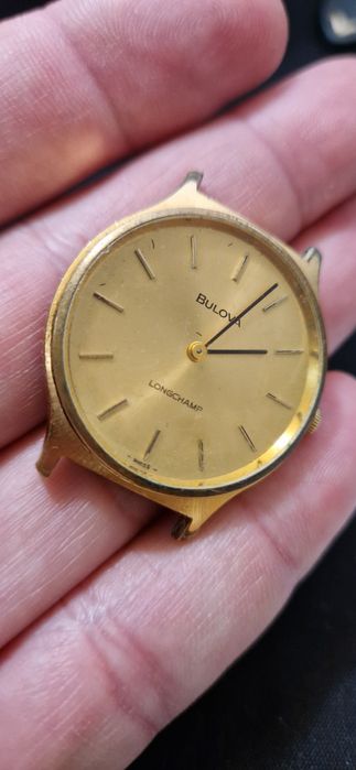 Vand ceas Bulova Longchamp.
