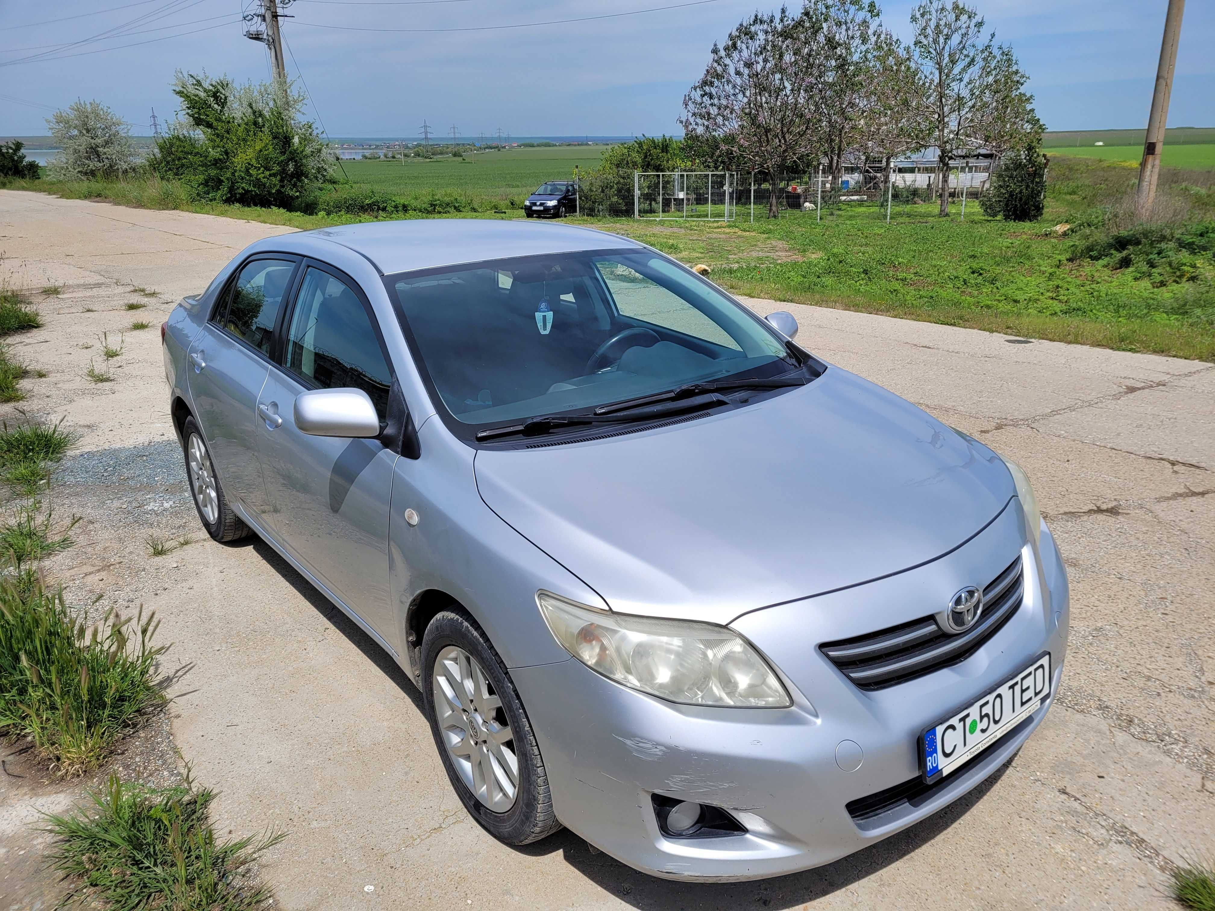 Toyota Corolla 1.6, benzina, sedan.