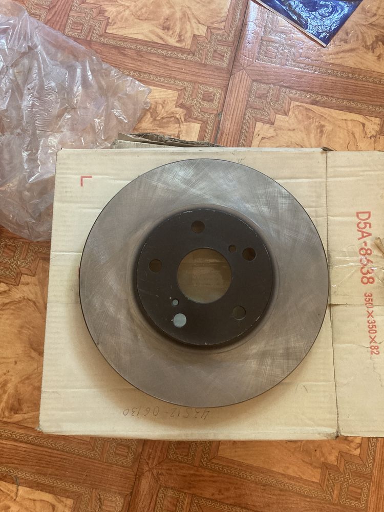 Тормозной диск передний на camry