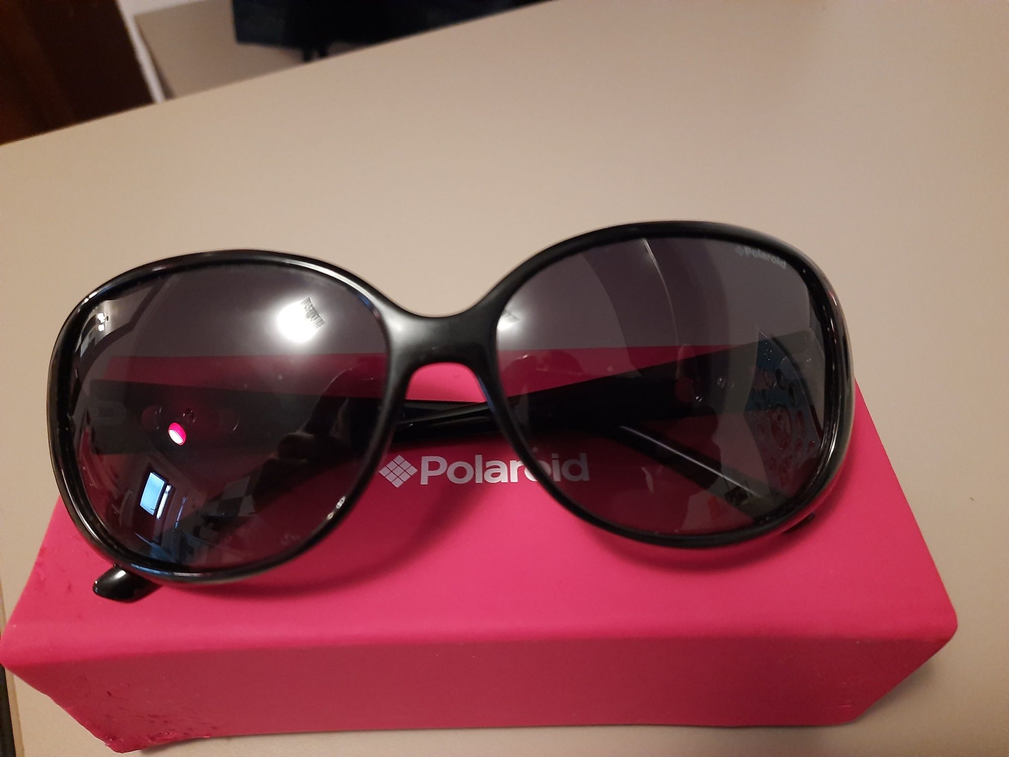 Ochelari de soare Polaroid si Polar Glare