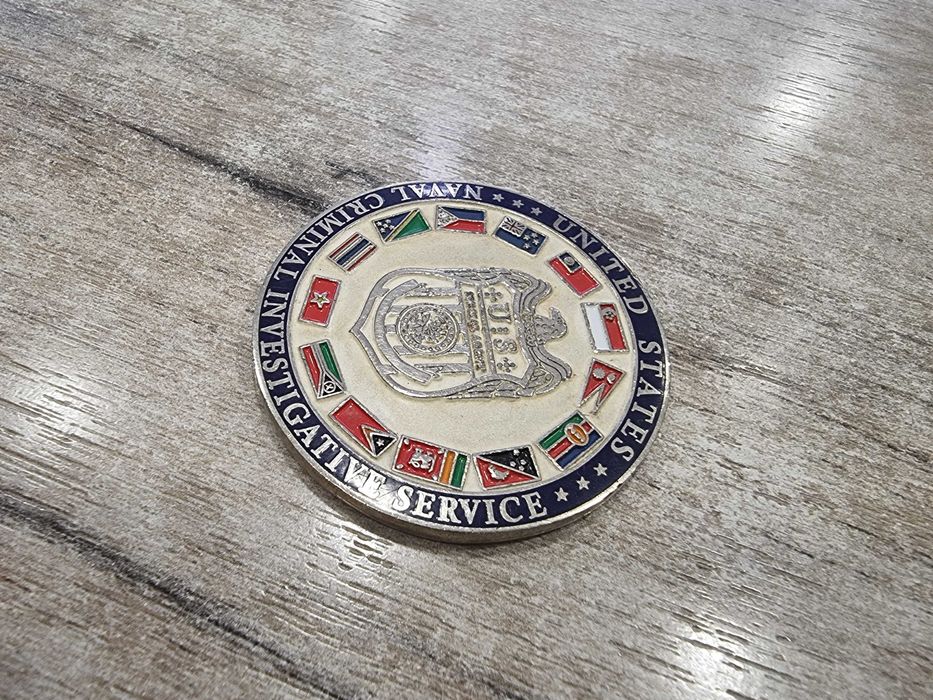 Монета NCIS Singapore