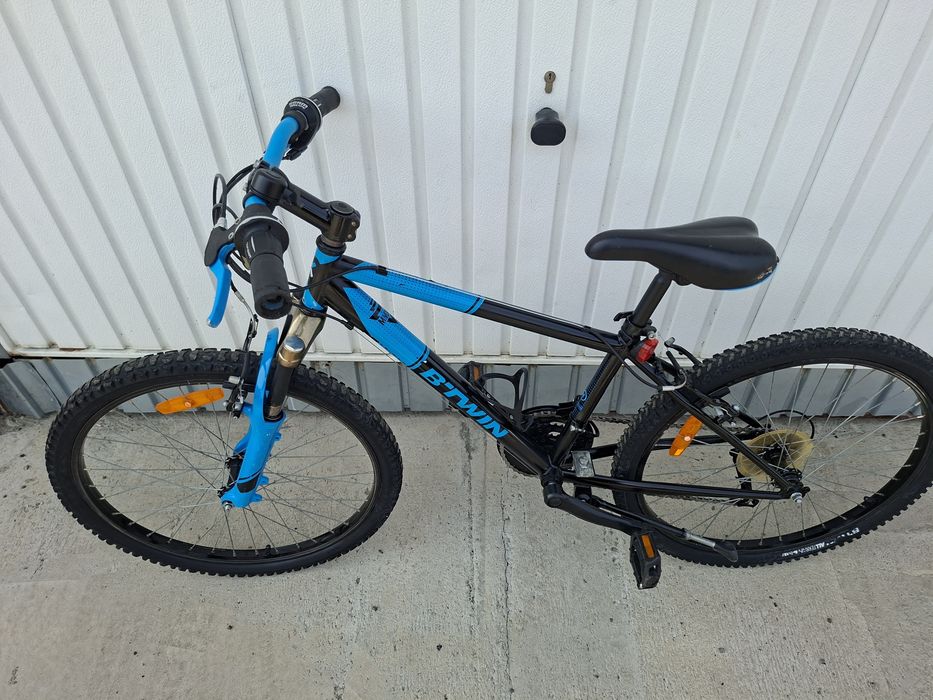 Bicicleta Btwin 24" pentru copii 8-12 ani.