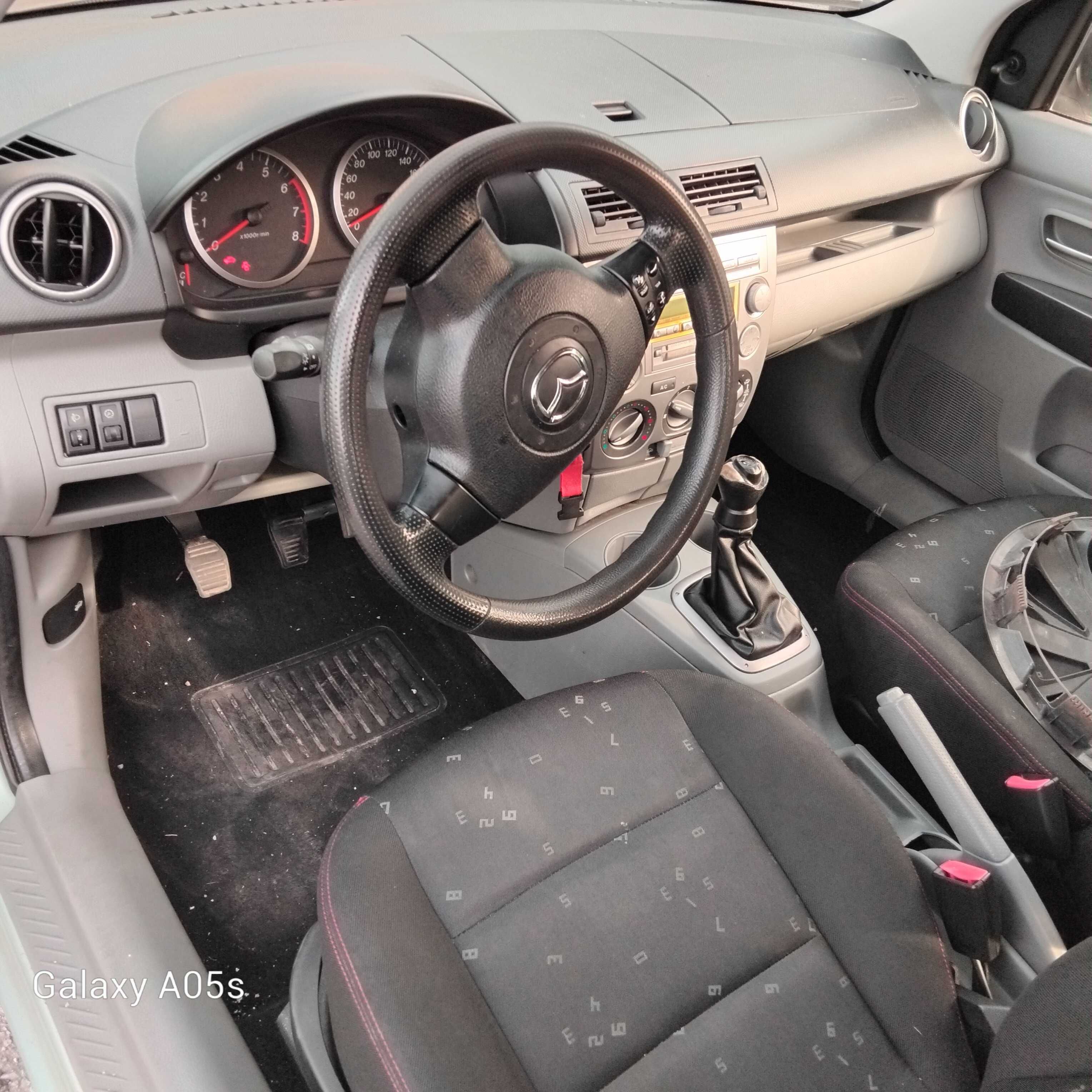 Mazda 2  1.2i 75 к.с. на части 2004г.