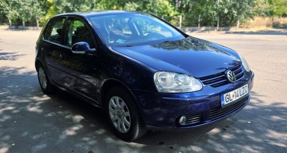 VW Golf 5 Tour 2007 1.6 benzina cu GPL AC 101 cai