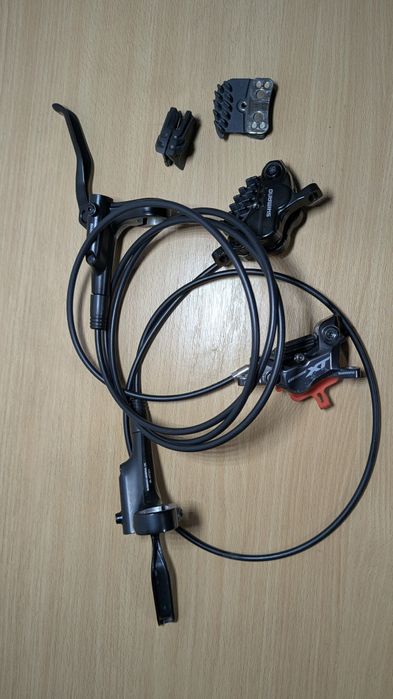 Set de frâne Shimano cu 4 pistoane
