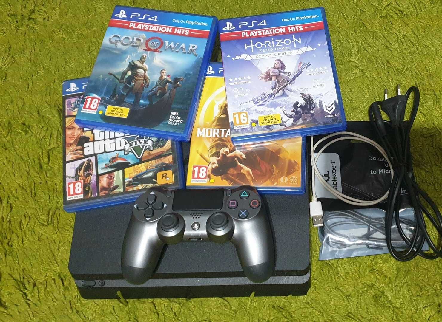 25 jocuri + PS4 SLIM cu GTA V, Fortnite, Mortal Kombat 11, 2 Manete