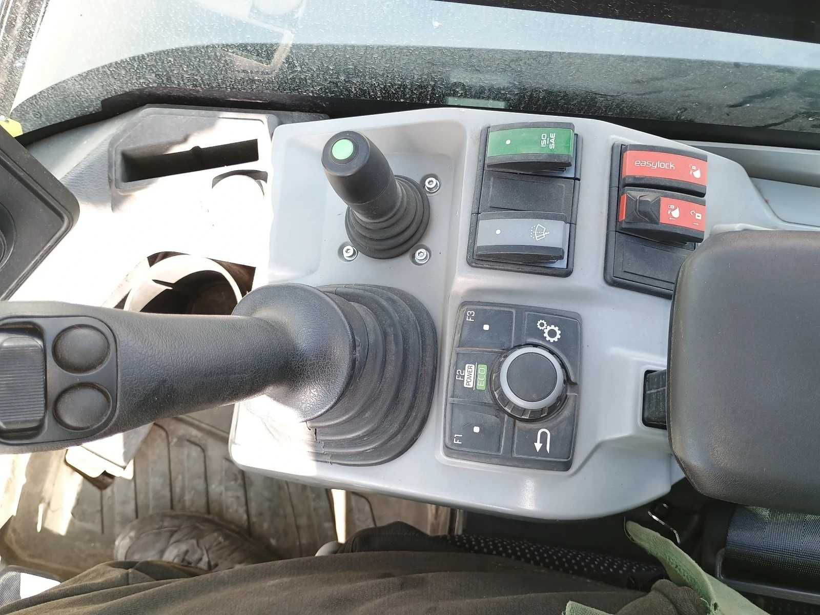 Багер Wacker Neuson