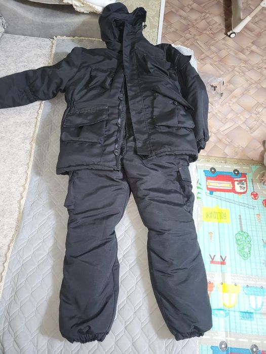 Продам  зимний комбинезон