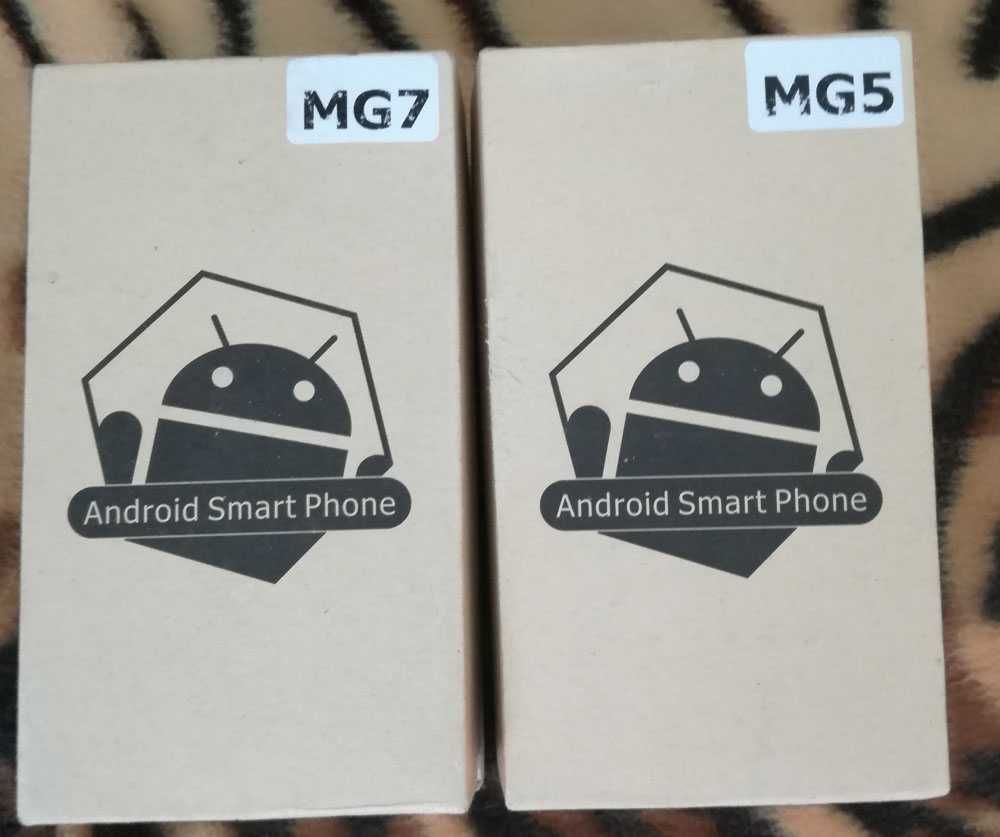 Два Смартфона MG7 и MG5-Dual Core,Dual Camera,Dual SIM Card и Слушалки