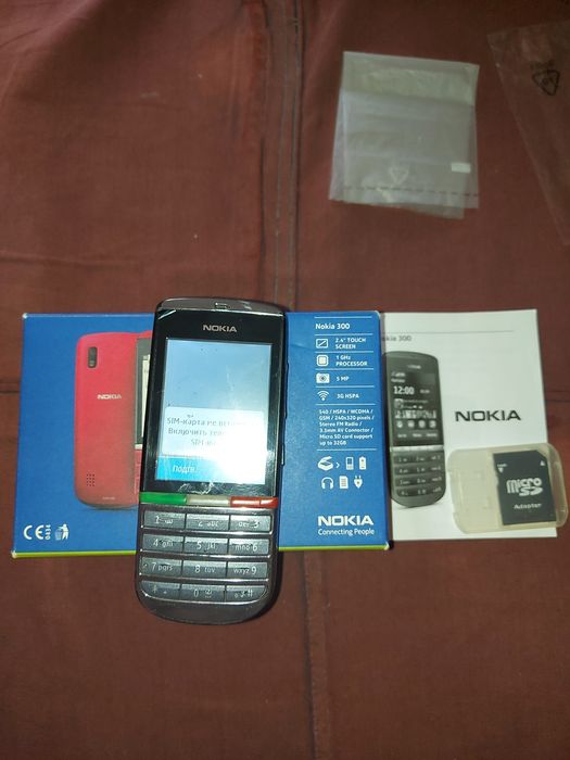 Подантся   телефон  полусенсар  нокия 300