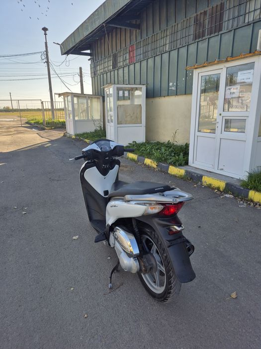Honda sh125i injecție