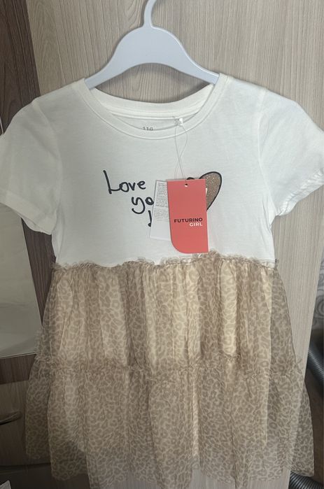 Продам новое платьишко на девочку 110 см