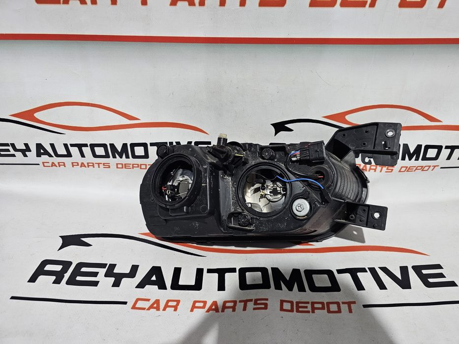 Far stanga Dacia Spring cod 260607303R