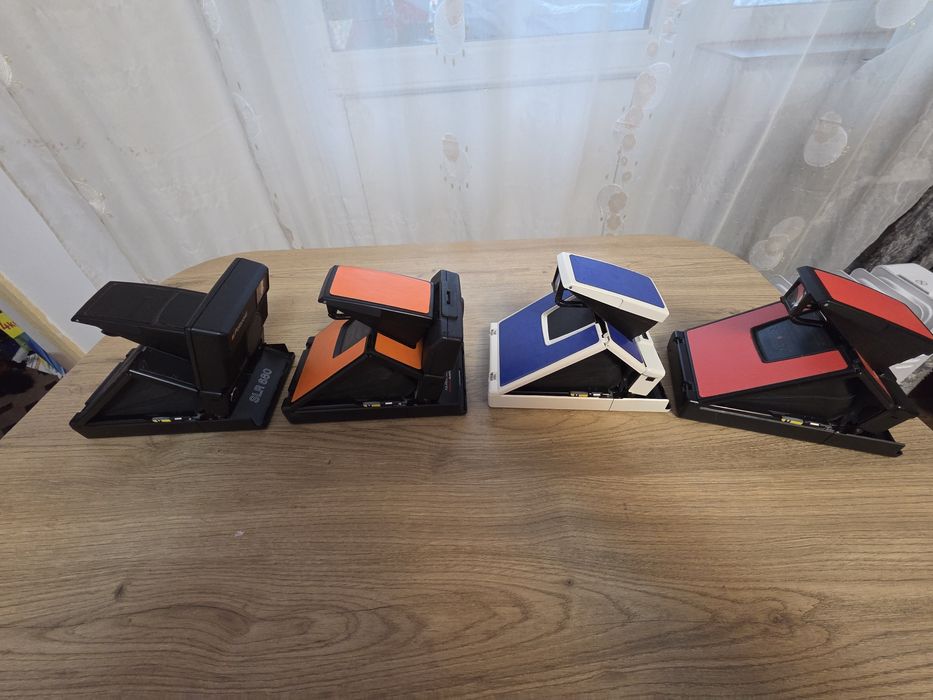 Camere pliabile polaroid SLR680 și SX-70