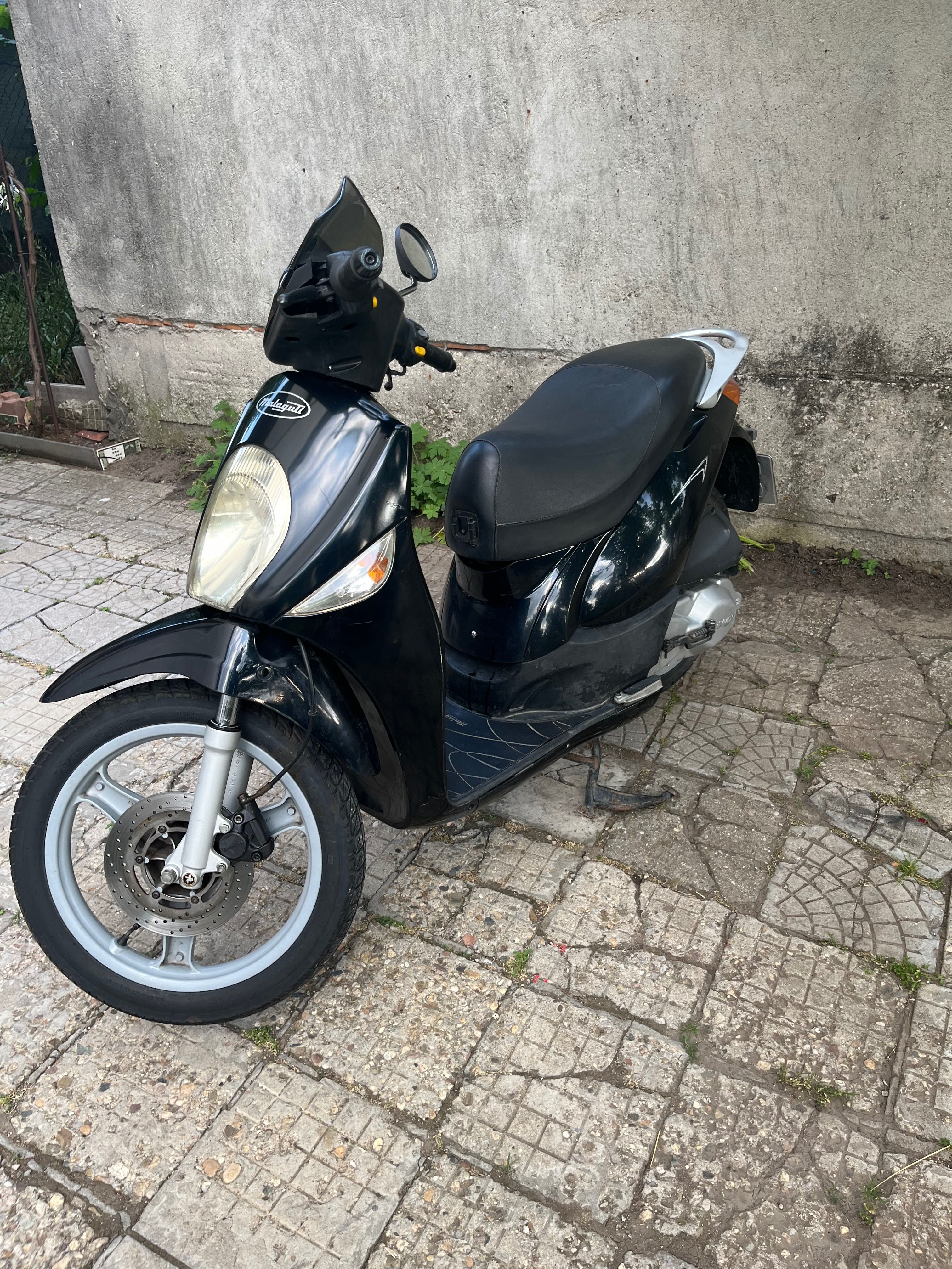 Скутер 125 кубика