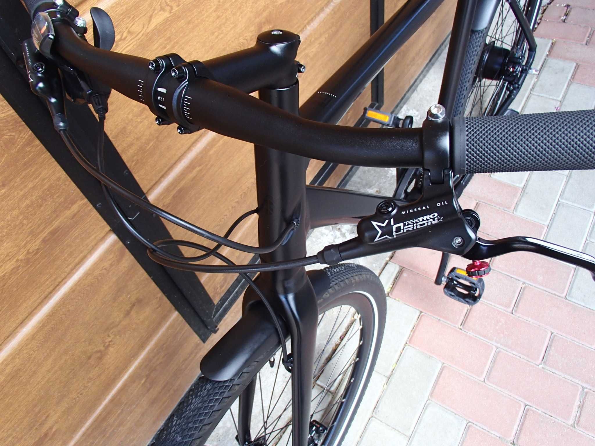 Bicicleta KOGA,transmisie pe curea,frana hidraulica disc