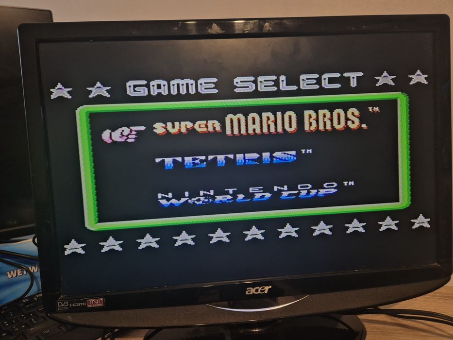 Nintendo NES plus 4 manete originale plus 2 jocuri