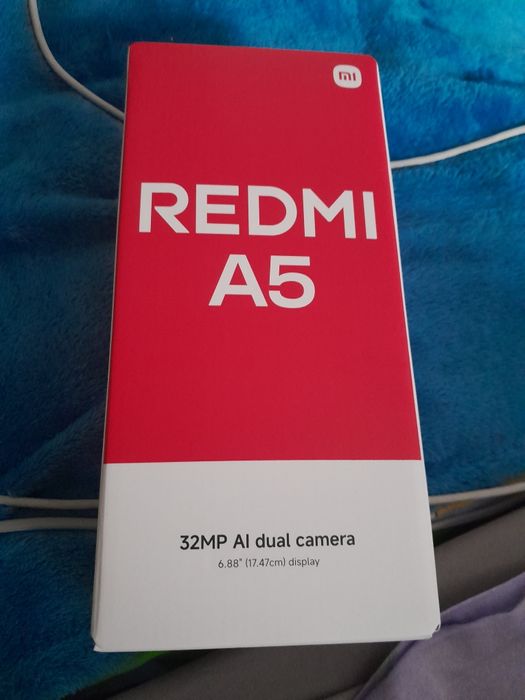 Продам новый телефон  REDMI5