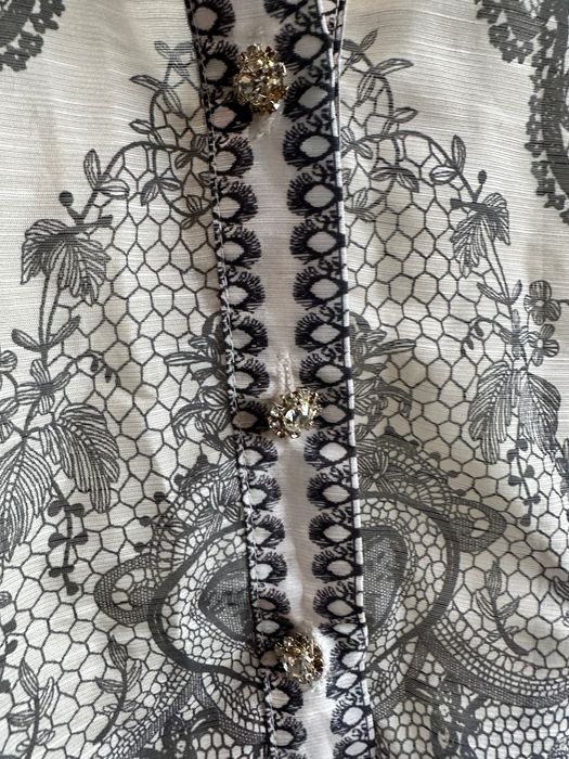 Комплект от къси панталонки и риза