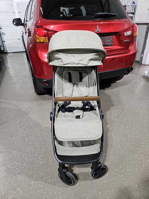 Carucior ultracompact pentru bebelusi, cu pliere automata Nuna TRVL
