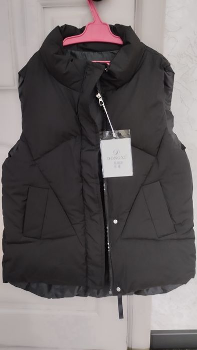 Продам жилетку женскую