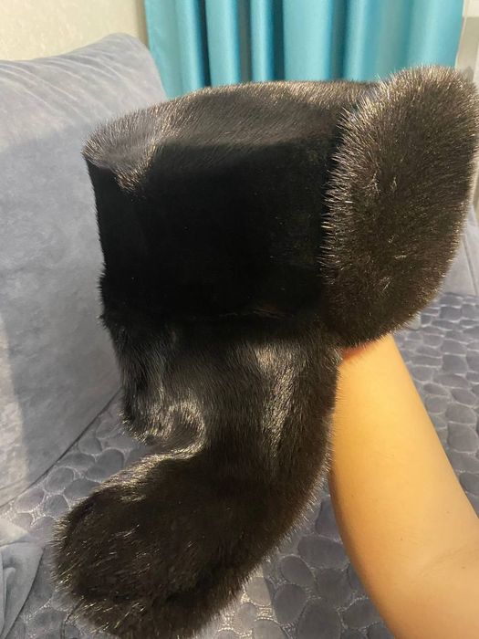 Продам норкавую шапку ушанку алмазно чёрного цвета в отличном состояни