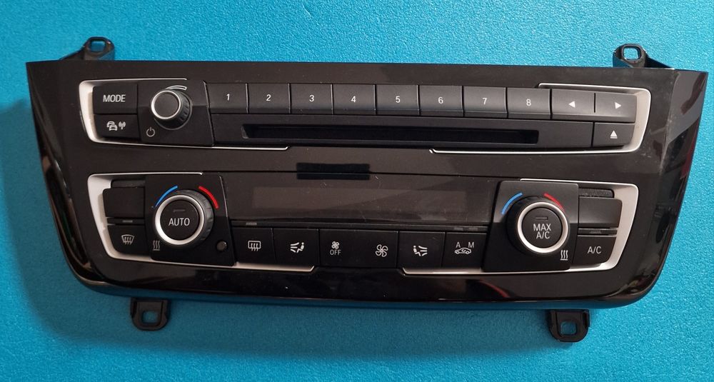 Vând panou modul clima cu comenzi radio BMW