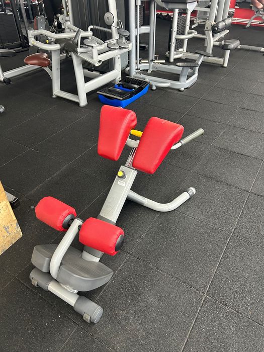 Vând bancă lombari technogym