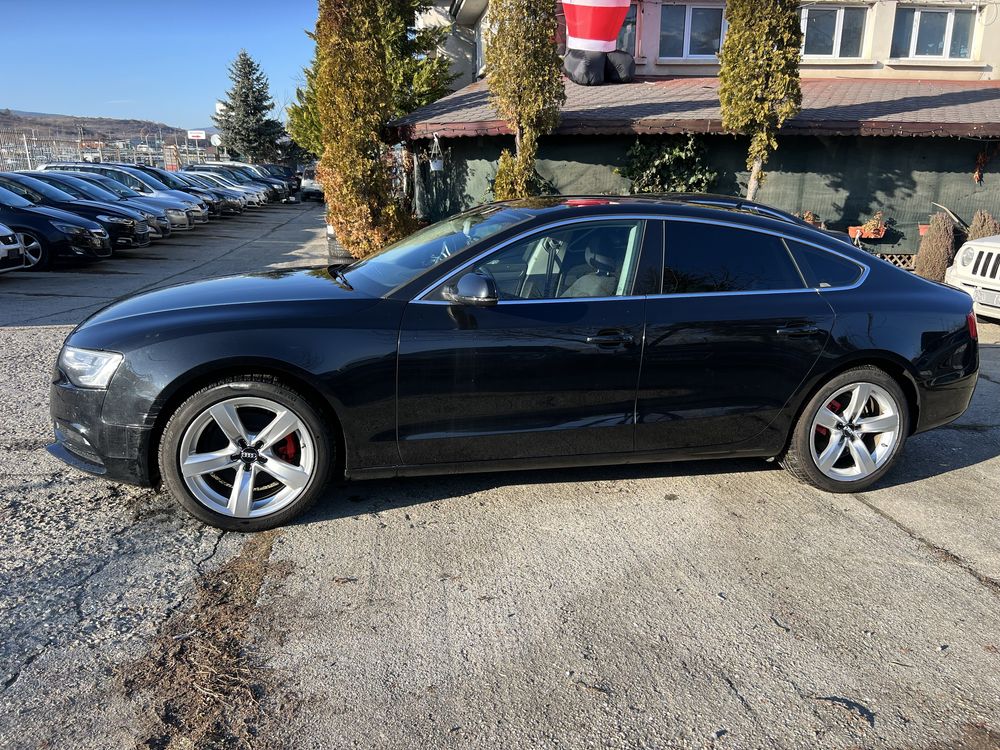 Audi A5 2.0TDI spotrback Quattro .