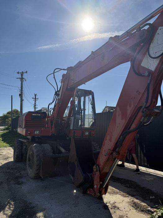Excavator pe roti O&K defect sau dezmembrez
