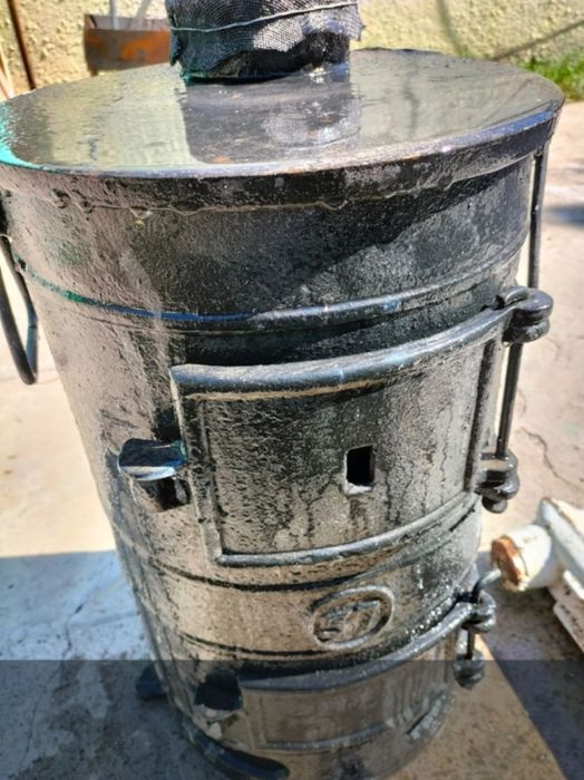 Печь буржуйку чугунная